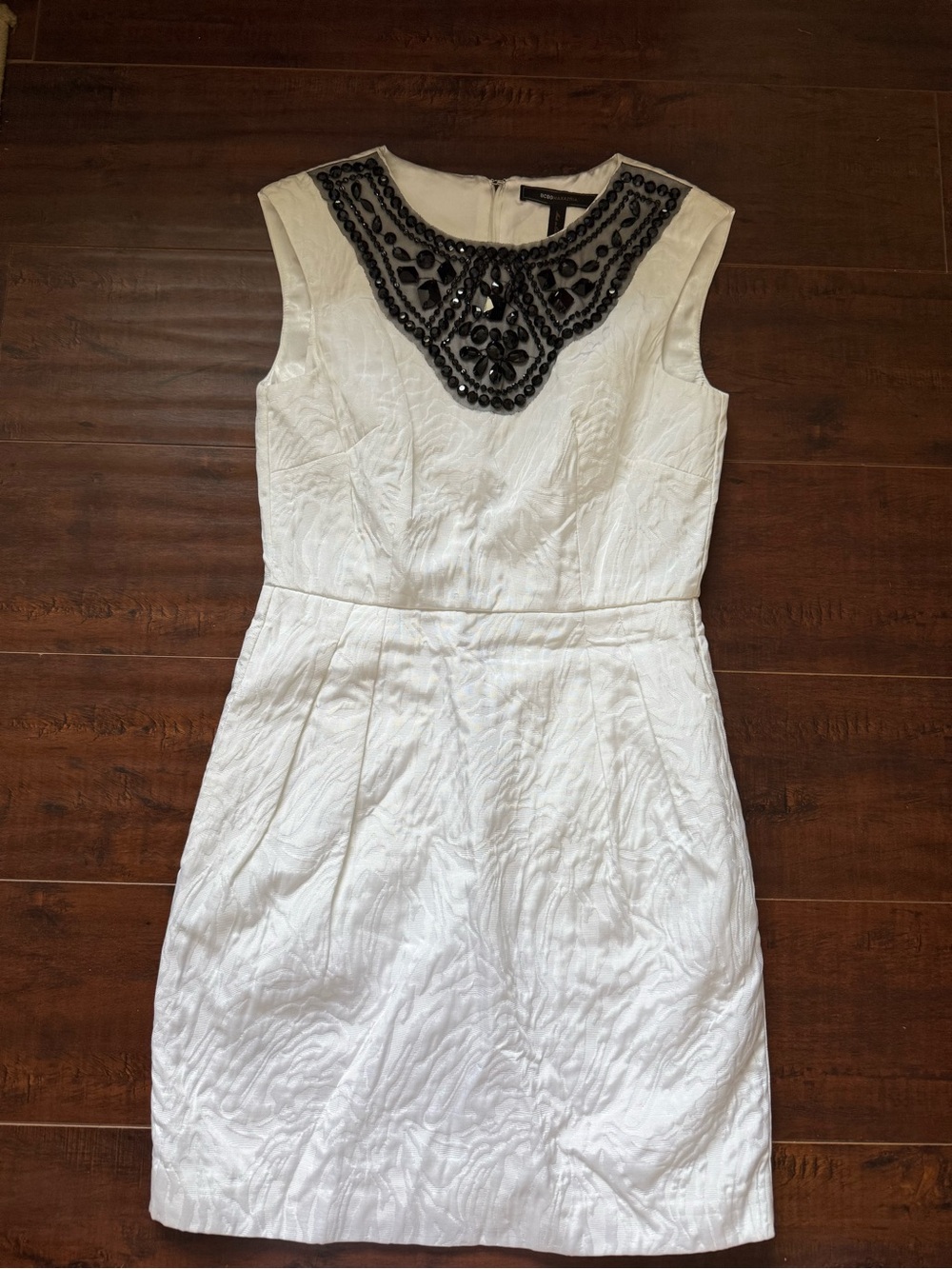 BCBGMaxAzria White Sleeveless Dress with Black Beaded Neckline